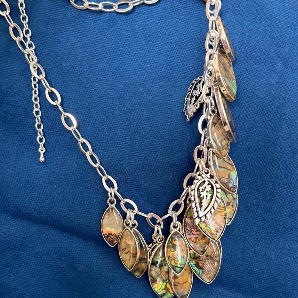 Premier Designs silver tone necklace with mother of pearl design dangling charms